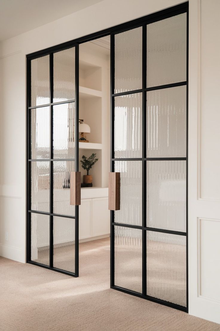 Japandi Apartment — reeded black glass doors
